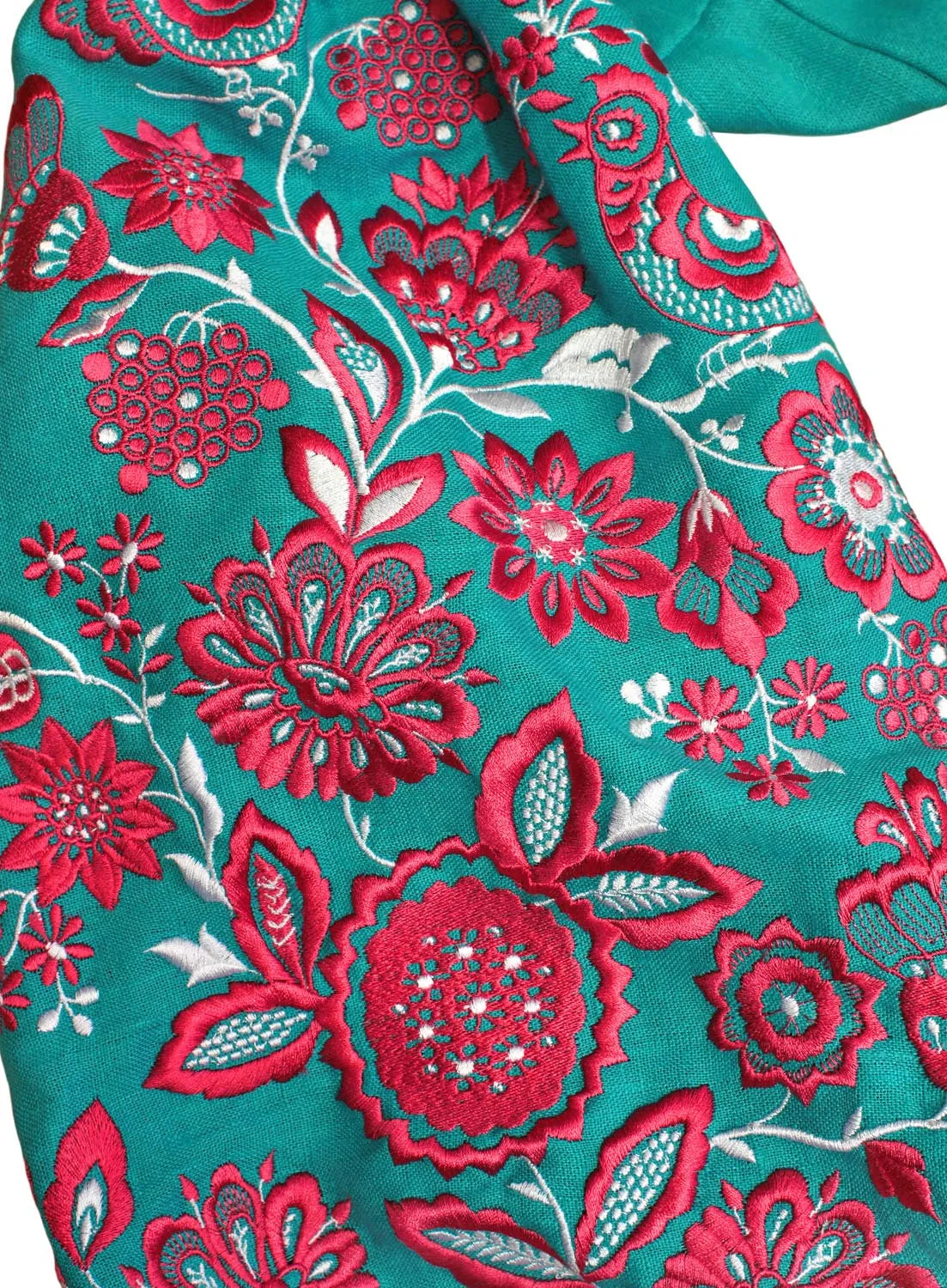 Turquoise kaftan with bright embroidery